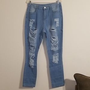 Light blue women's damaged distressed jeans